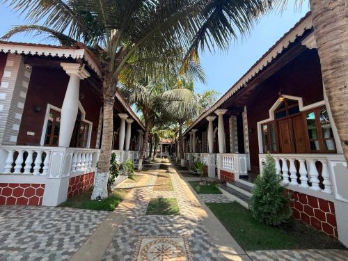 Baga Hotel | Baga Beach Palm Cottage