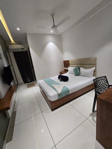 Kozhikode Hotel | Blossom suites