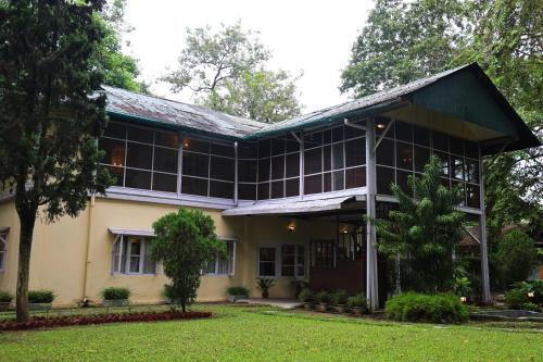 Dibrugarh Hotel | Chowkidinghee Heritage Tea Bungalow