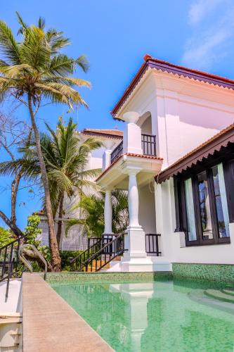 Pilerne Industrial Estates Villa | ELIVAAS Villa Seine Indo-Portuguese 3-BHK villa with a Kid's Room, Private pool Near Candolim Beach