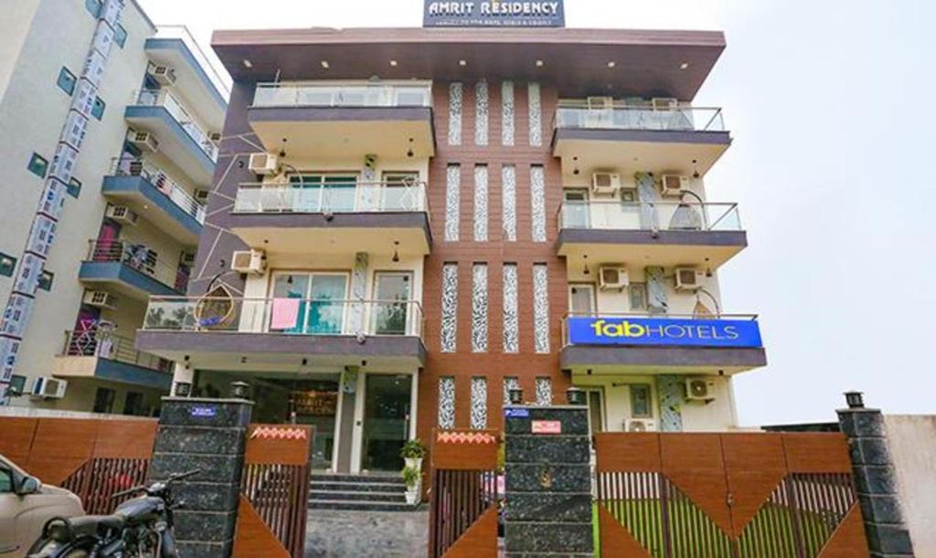 Udyog Vihar Hotel | FabHotel Amrit Grand