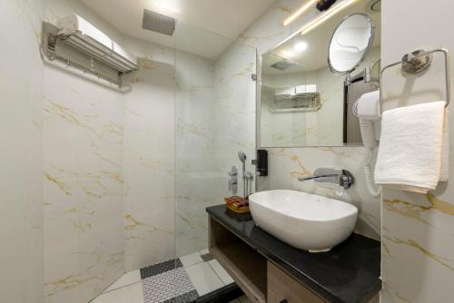 Sualkuchi Hotel | Ginger Guwahati , Garal Chowk