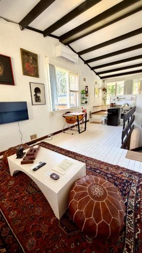 Budgewoi Villa | MELLOW TREES Lake front studio with sauna