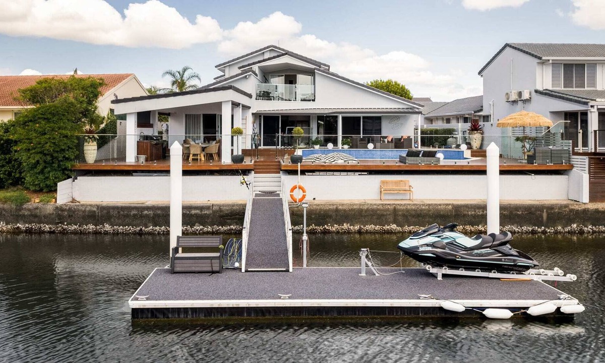 Runaway Bay House | Modern Waterfront Retreat| Private Pool & Dock