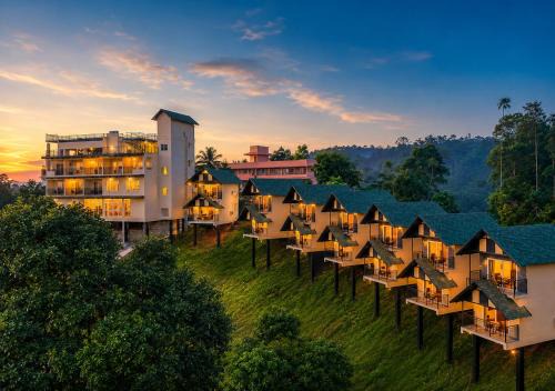 Devikolam Resort | Nature Green Pool Resort Munnar by VOYE HOMES