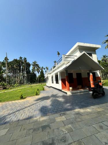 Nilambur House | Natures Adobe