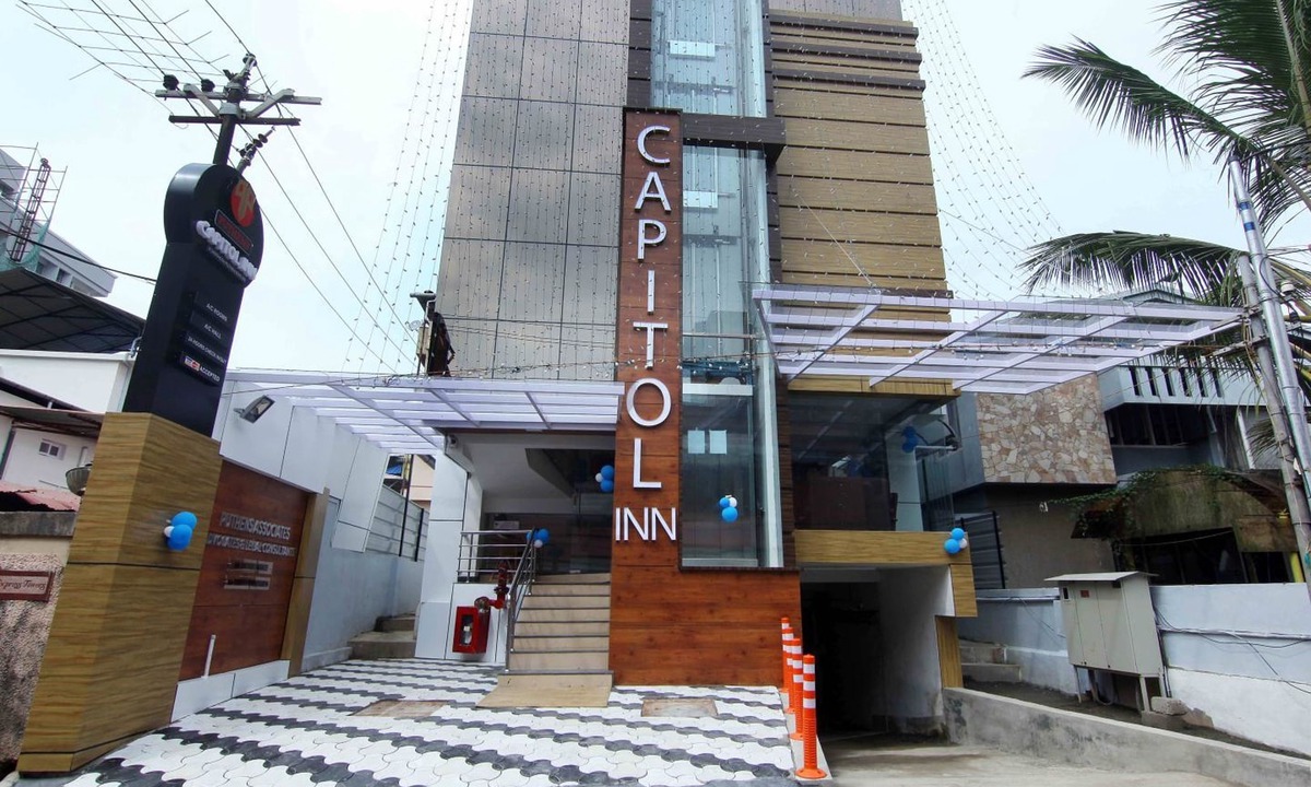 Kaloor Hotel | OYO 18604 Puthens Capitol Inn
