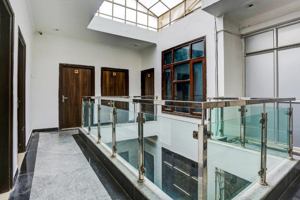 Jharsa Village Hotel | OYO Flagship Balaji Residency