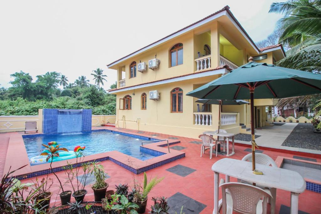 Sernabatim Apartment | Pool View 1BHK Home Colva, Goa