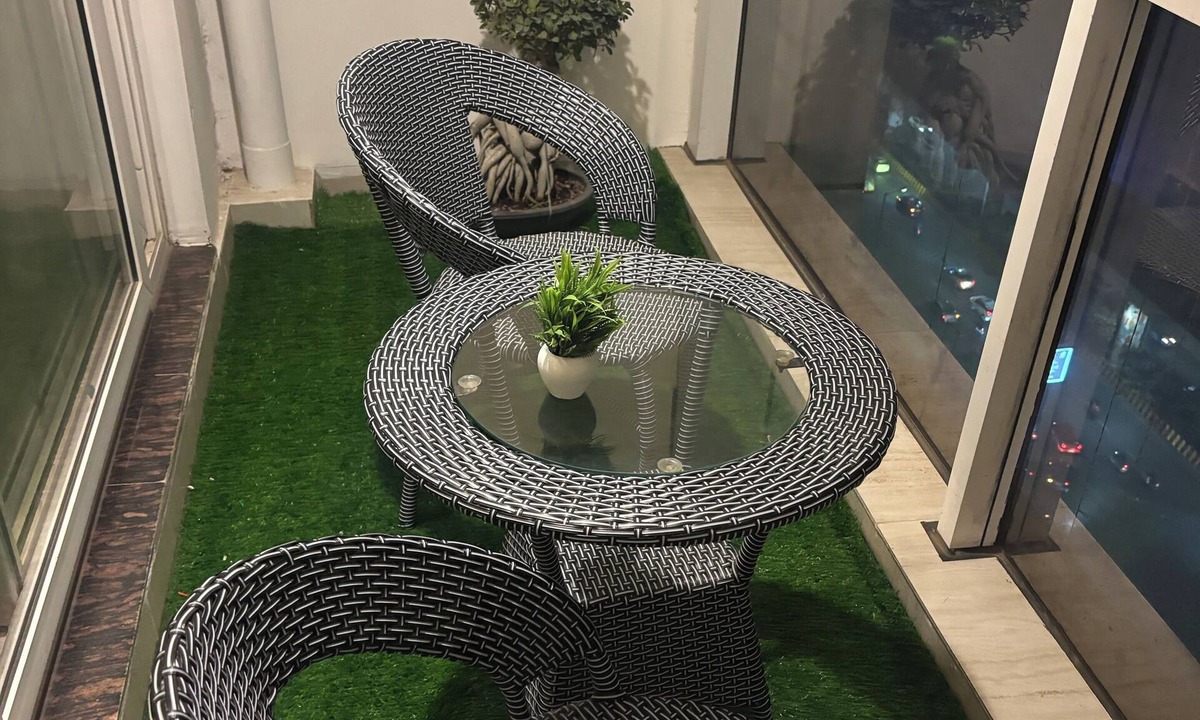 Noida Apartment | Premium Studio Retreat at Spectrum Mall | Private Balcony & City Views