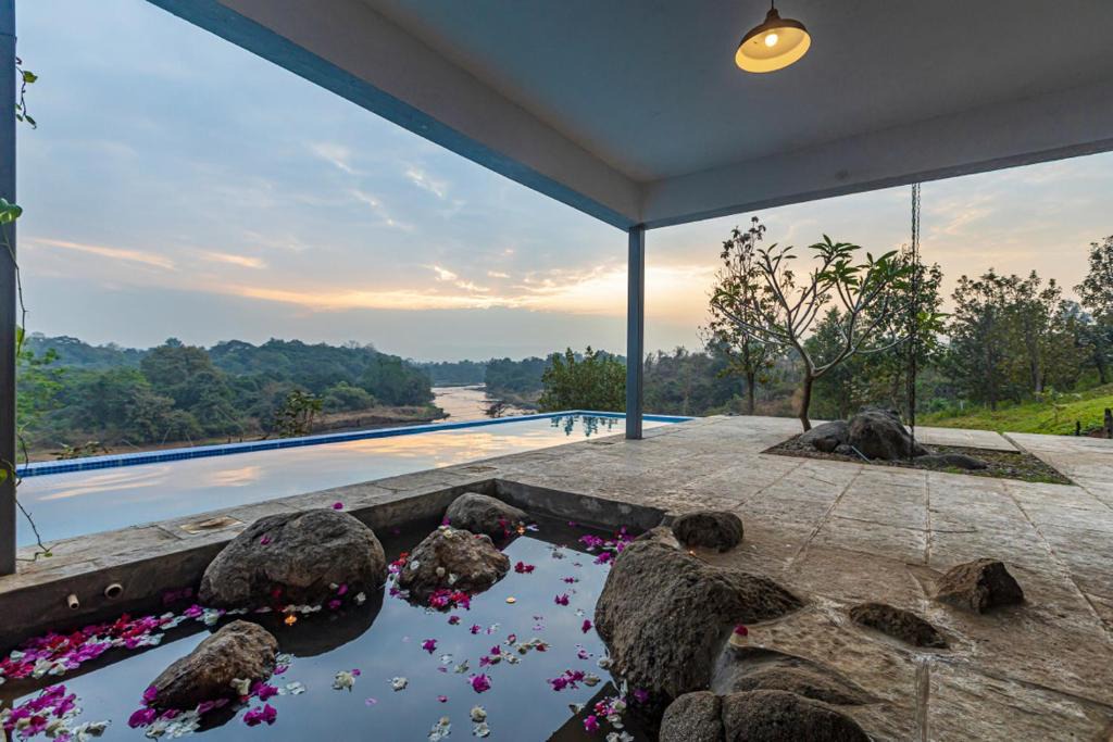 Karjat Villa | SaffronStays One Tree Farm, Karjat - infinity pool villa with amazing river views