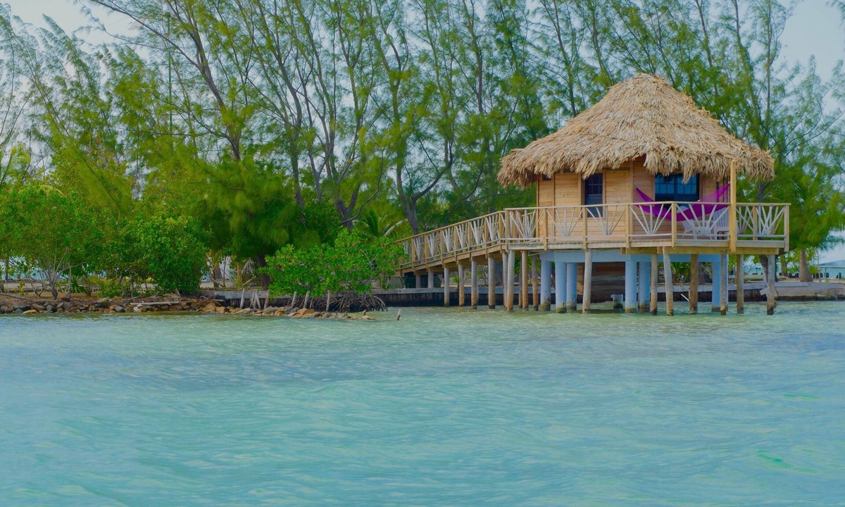Thatch Caye Resort | Spacious Overwater Bungalow w/Air Conditioning & Private Walk-In Shower