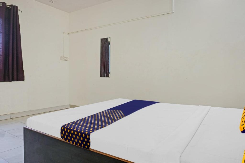 Wadgaon Hotel | SPOT ON Nisarg Lodging & Boarding