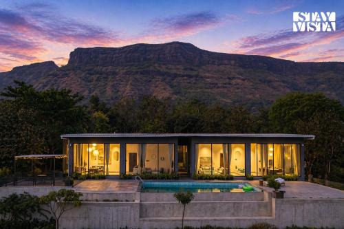 Paud Villa | StayVista at Evara Farms with Pool, Lawn & Mountain View