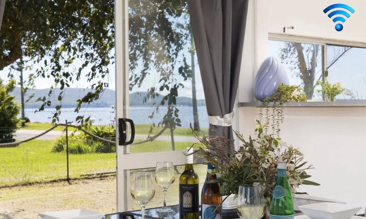 Swan Bay House | Waterfront Cottage - direct waterfront access, boat-friendly block, firepit, water views