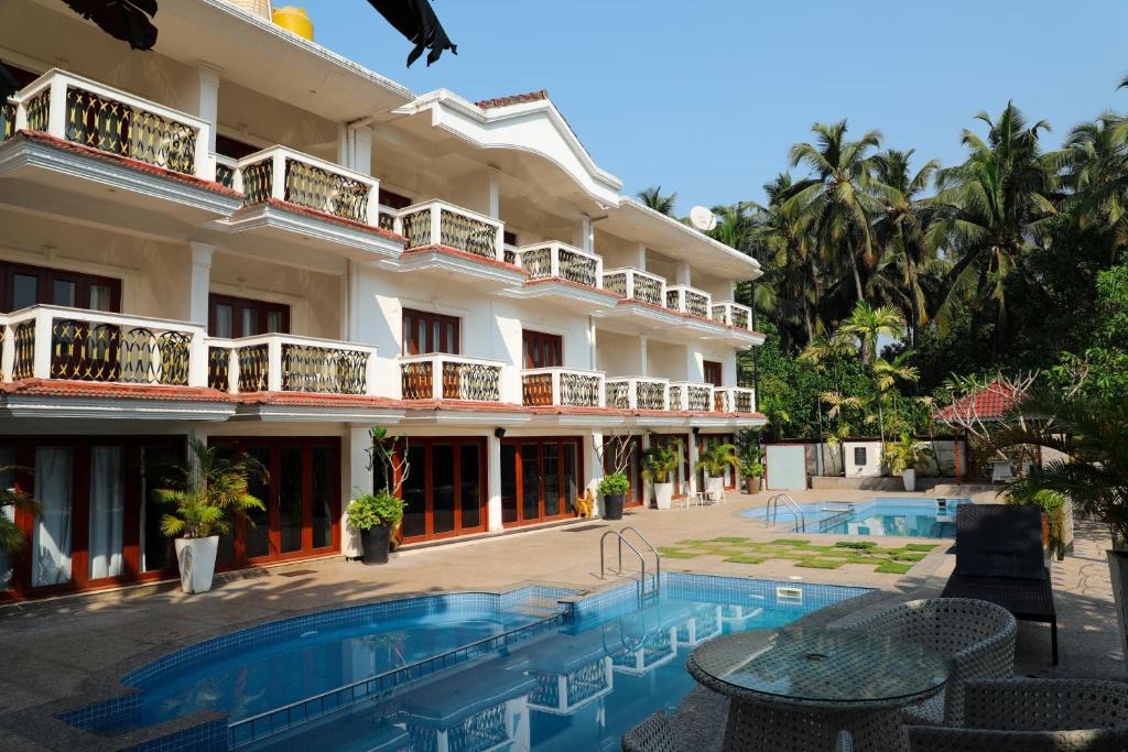 Arpora Hotel | White Pearl Suites by Rosetum