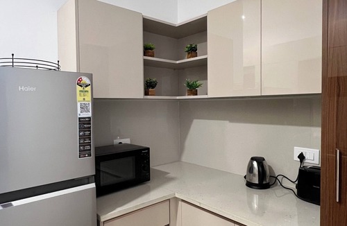 Mayapur Apartment | 2-bedroom modern condominium with hill views