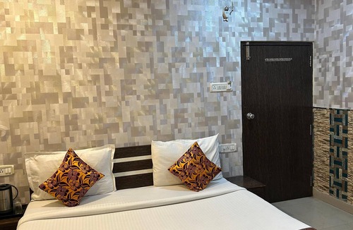 Varanasi Hotel | 45-room hotel in delightful Varanasi with WiFi, AC. Unwind in comfort