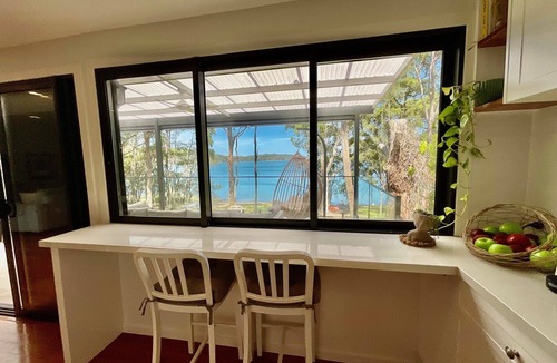 Smiths Lake House | Absolute Lakefront Retreat | Sleeps 10 | Pet Friendly | Kayaks & SUPs