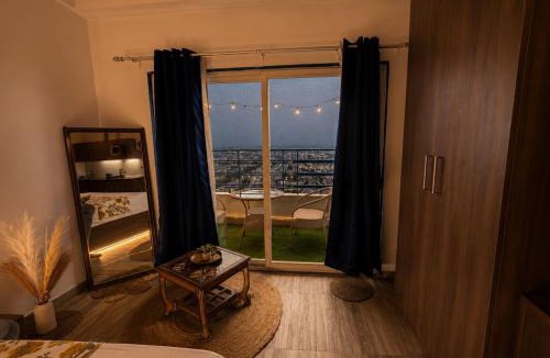 Greater Noida Bed & Breakfast | Aesthetic High-Rise Studio , Balcony & Villa View
