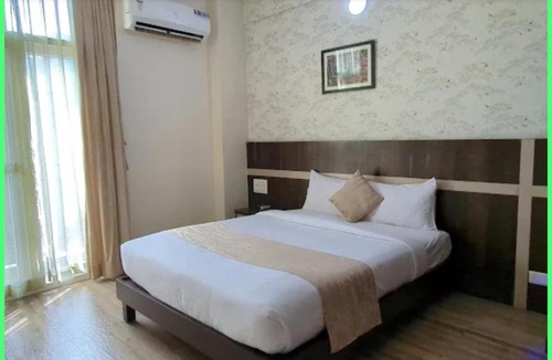 Koramangala Hotel | AVM Comforts Inn Koramangala
