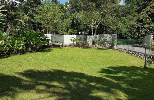 Kampung Lepok House | Beautiful British Tudor Home with Amazing View and Large Garden Wedding Space
