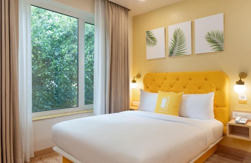 Gachibowli Hotel | Bloom Hotel - DLF Road Gachibowli