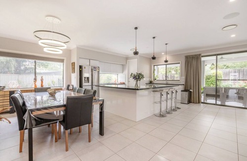 Curtin Apartment | Charming 4-Bed Getaway with Pool & Garden Oasis