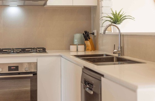 Warilla House | Coastal Palms - Recently Renovated Beachside Haven