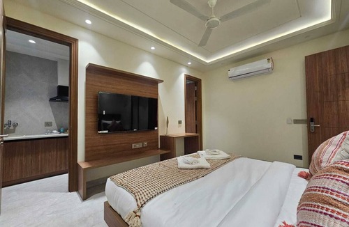 Gurugram Hotel | Deluxe Studio Room with Kitchenette