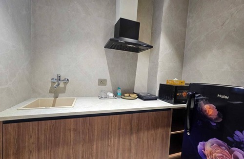 Gurugram Hotel | Deluxe Studio Room with Kitchenette