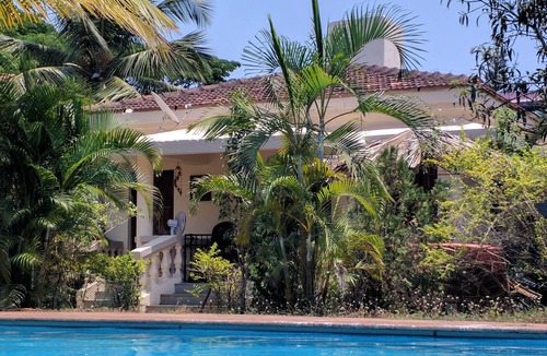 Varca House | Detached 2 Bed 2 Bath Bungalow with private patio, gardens, and very large pool