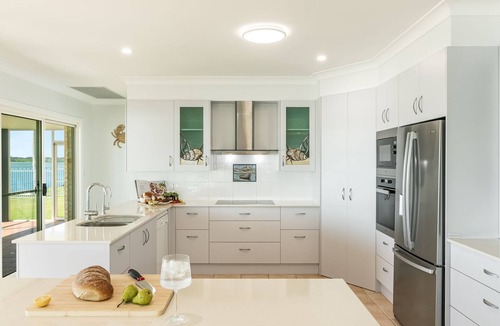 Yamba House | Dolphin View - Elegant Waterfront Haven with Private Pontoon - Holiday Yamba