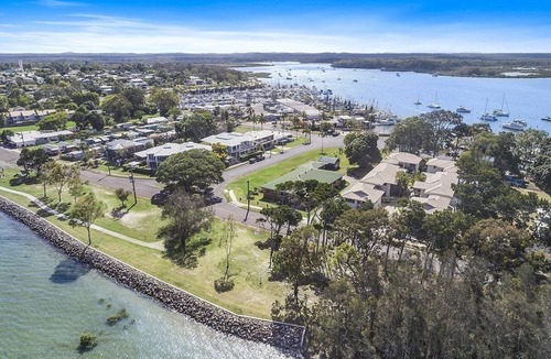 Tin Can Bay House | Exceptional modern three bedroom townhouse with water on both sides.