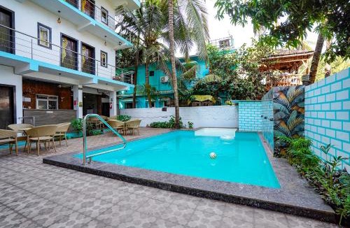 Morjim Hotel | FabHotel Palm Inn Resort