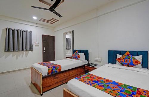 Rajgurunagar Hotel | FabHotel Pearl Inn
