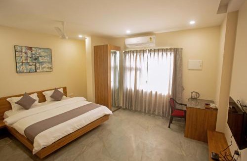 Beltola Hotel | Grey House Inn