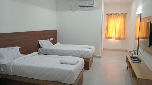 Bengaluru Hotel | Hotel Aaryan Comforts - Peenya