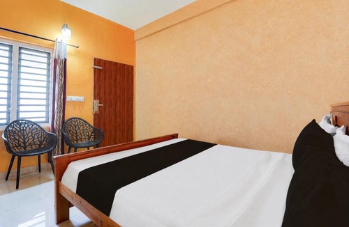 Kozhikode House | lQ Rooms