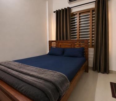 Kozhikode House | lQ Rooms