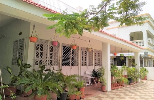 Gandhinagar House | Luxurious Room with Balcony in Centrally located Bungalow