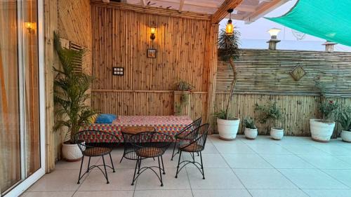 Sikandra House | Madhuvana - मधुवन - Cozy Bamboo House on Terrace