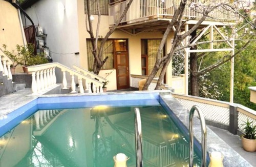 Dharampur Villa | Mansaayan Villas by Aurella Hospitality-3BHK Luxury Valley View Villa in Kasauli with Private Pool, Treehouse & 70 inches Smart TV Bar Lounge