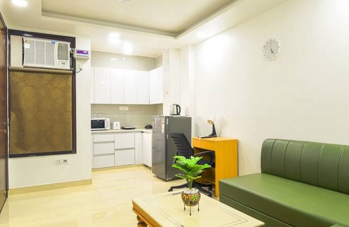 Gurugram Apartment | Modern loft overlooking hills and park