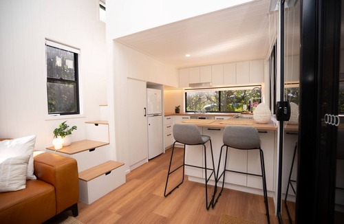 Nunderi Cabin | Nestled in Nunderi, this loft style tiny home offers a special retreat for two!
