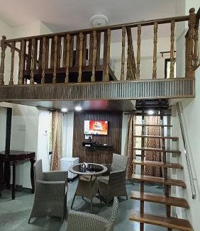 Alibaug House | NivaantatVicharays Palm View Family Room