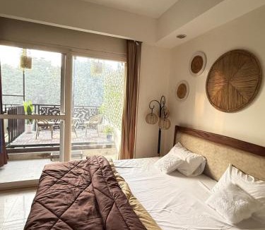 Sushant Lok Apartment | Noor by Saanjh, 1BHK Serviced Apartment, Boho Balcony, Golf Course Road, Sector 43