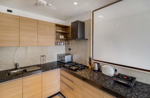 Kurla Apartment | OV Premium Apartments near BKC by SquareOne Stays