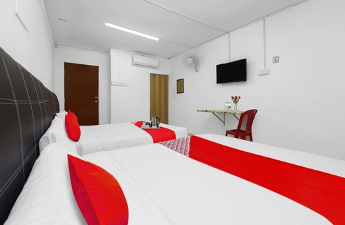 Gua Hotel | OYO 90873 Travellers Inn