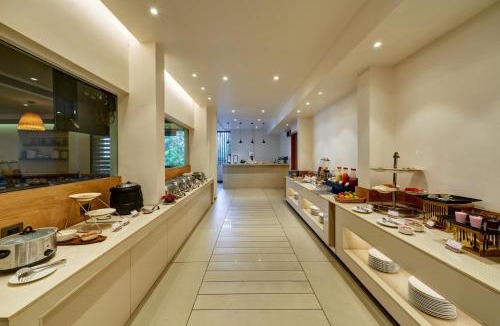 Kolhapur Hotel | Regenta Place Raysons Kolhapur